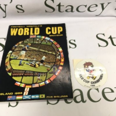 A 1966 World Cup Willy car sticker and a football monthly World Cup 1966 souvenir magazine in good condition.