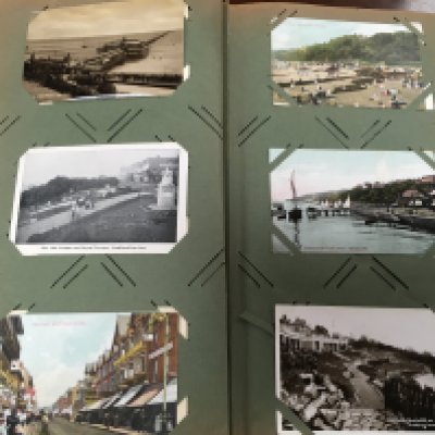 Two postcard albums including Southend-on-sea views