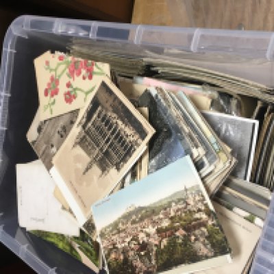 Four boxes of postcards various.