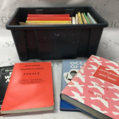Two boxes of magic books including various magician handbooks and some encyclopaedias as well as some clown comedy books.