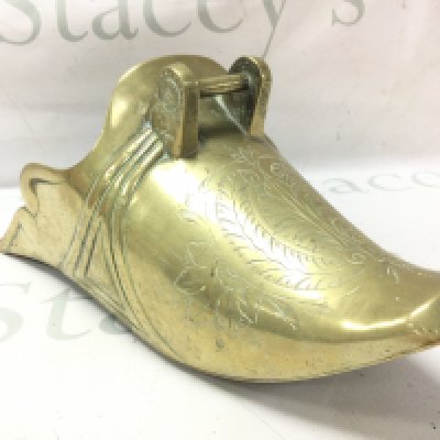 A vintage South American Gauchos brass overshoe 13cm tall 29cm tall. Postage category B