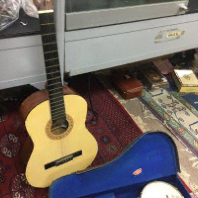 An acoustic Horner model MC 05 classical acoustic guitar and cased a John Grey & Sons Banjolele