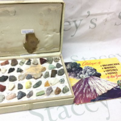 A box of New Zealand rocks and crystals with catalogue in original box . Postage category B