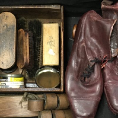 A pair of vintage leather roller skates . postage cat C- NO RESERVE