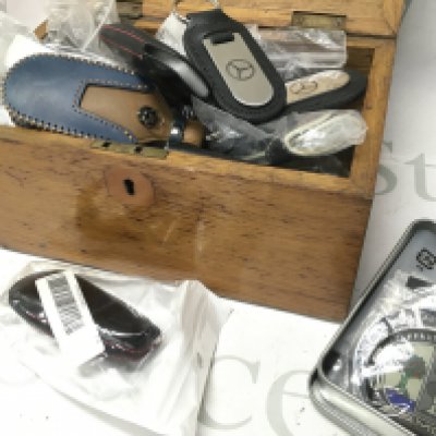 A collection of car key pouches including Mercedes AMG. No reserve Postage category B