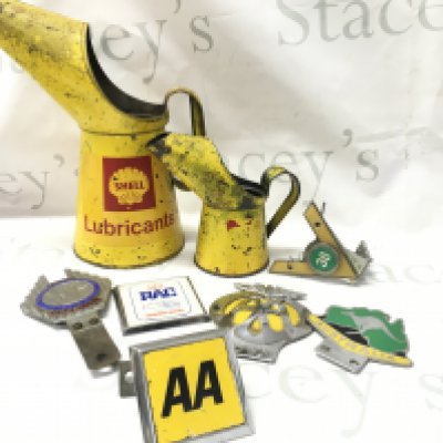 Vintage motoring items including two shell lubricant cans, AA badges, Australia car badge, St Christopher car badge etc . No reserve postage category C