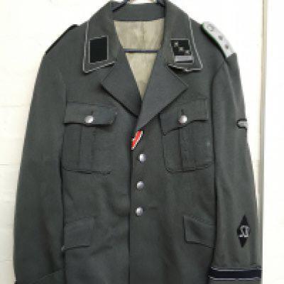 A WW2 German Third Reich Tunic M38 for a Hauptstrumfuher of the security service (SD) with silk lining and an opening for side arm . Postage category C
