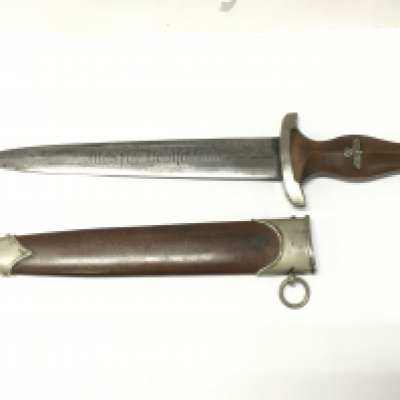 A rare WW2 German Third Reich S.A full Rohm honour dagger by SMF Solingen with inscriptions- Alles Fur Deutschland and the reverse- In Herzlicher Kameradschaft Ernst Rohm. With anodised scabbard. blade 22.5cm long approximately 35cm total dagger length. This lot cannot be posted