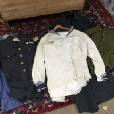 A collection of retrospective military uniforms including RAF jacket,  Kriegsmarine jacket ,RAF Long coat, Royal Marines commando camo jacket etc