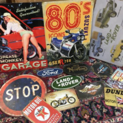 A collection of metal advertising signs , including cast iron special air service who dares wins sign, Norton, Ford, Land Rover . This lot cannot be posted