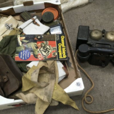 A collection of military items including a telephone set f mk 2 tmc, Luftwaffe flags, US Khaki army hat, Nazi medic arm band, Nazi small sacks,