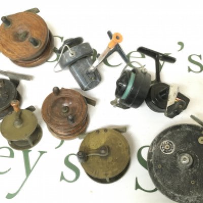 A collection of antique and vintage fly fishing reels including Seldex J.W YOUNG, brass and wooden reels , spinning reels including Garcia Mitchell 320 etc. postage cat B