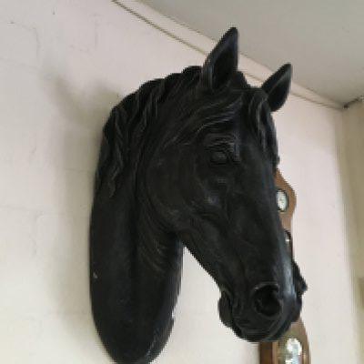 A vintage metal wall hanging horses head . 52cm tall 18cm wide approximately.This lot cannot be posted