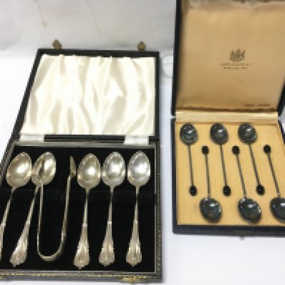 Kirby boxed coffee spoons and another set of coffee spoons with sugar tongs . Postage category b