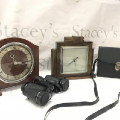 Two vintage clocks and a cased pair of Aicio 8x30 rapide binoculars. This lot cannot be posted