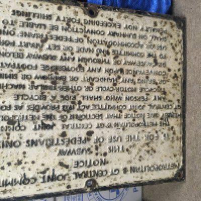 A cast iron railway sign metropolitan notice use of pedestrian only. 52 cm x 62 cm .