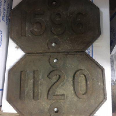 Two cast iron bridge plates 1120 and 1596 .