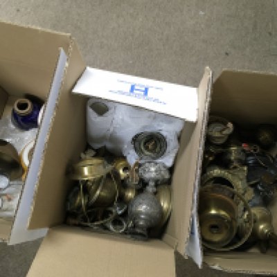 Three boxes containing Victorian oil lamp parts, shades and chimneys