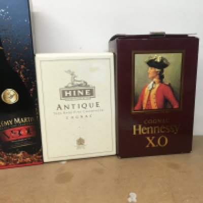 Three bottles of cognac .