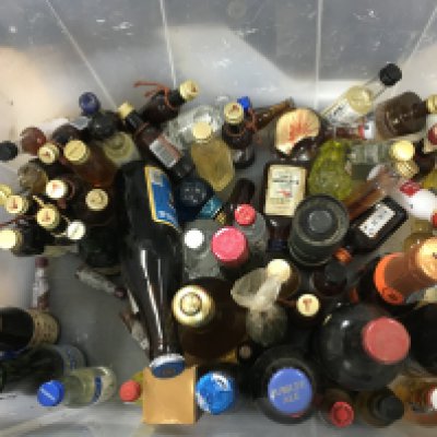 A collection of miniature alcohol including whiskey etc