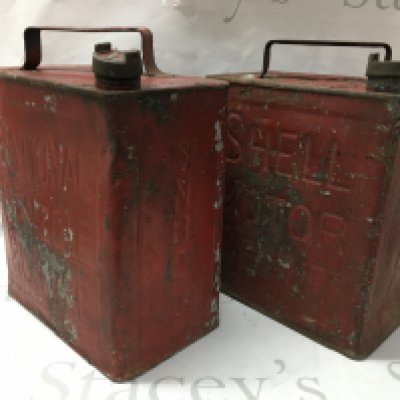 Two vintage Esso shell cans and one armstrong hydraulic oil cans.