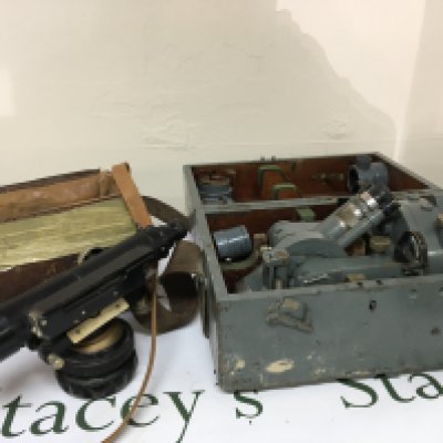 A Vintage Theodolite possibly Air Ministry issue maker Cooke Troughton & Simms in a fitted case with accessories. And a leather case containing a Vintage civil engineers Dumpy Level. (2)
