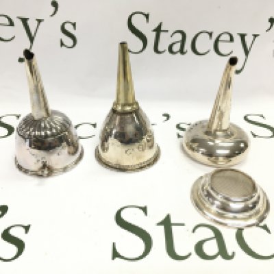 Three silver plated wine funnels. Postage B