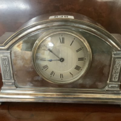 A Buren silver plated mantle clock. 25cm x 15.5cm x 8cm
