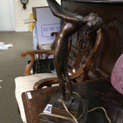 An Art Deco spelter lamp base in the form of a maiden