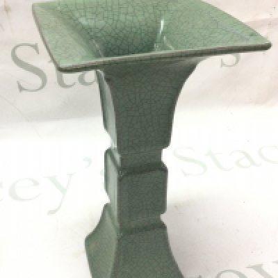 Green Chinese Gu vase with a four character stamp on base. 23cm tall. This lot cannot be posted