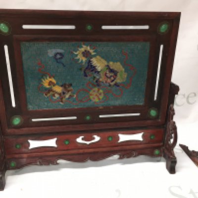 A Chinese Cloisonne Dragon and pearl screen jade insets and carved wooden design . A Section needs re gluing. 36.5cm tall 41cm wide