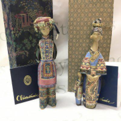 Two boxed porcelain oriental Chinaramic figures . 28cm tall approximately