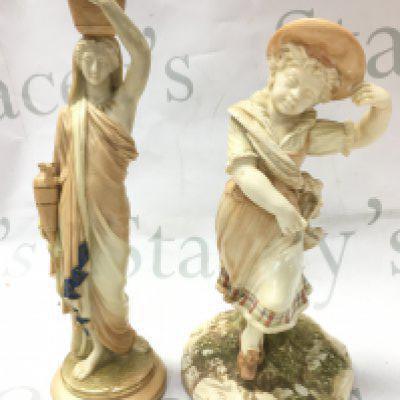 Two Victorian blushed Ivory Royal Worcester porcelain figures , female water carrier and a young girl signed Hadley. 25 and 23cm tall. This lot cannot be posted
