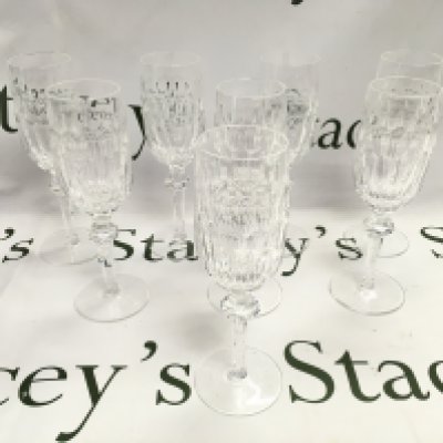 8 Waterford crystal champagne glasses. No obvious damage noted.