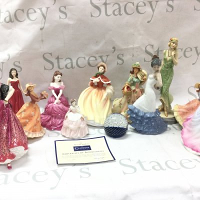 A collection of ceramic figures including Royal Doulton including figures Carmen HN3993, January Garnet HN 4970, Faye CL3984 , NAO, Leonardo ,Caithness paperweight etc. this lot cannot be posted