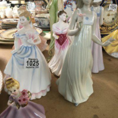 A collection of 12 figures including Doulton.