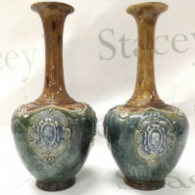 A pair of Royal Doulton Lambeth vases 25.5cm tall. This lot cannot be posted