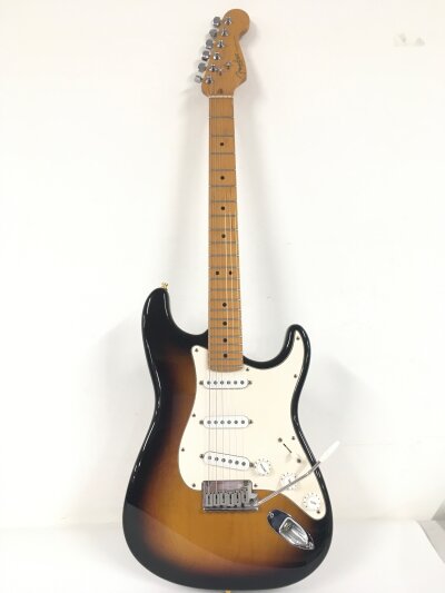 A 1998 USA Fender Stratocaster in classic sunburst finish. Comes with original Fender branded hard carry case and case candy. Serial number N8372722.