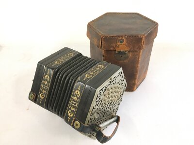 A fine quality Charles Jeffries Concertina with original leather case.