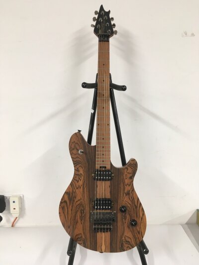 An EVH Wolfgang Standard electric guitar. Comes with soft carry case.