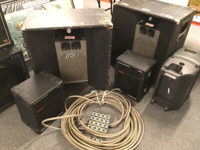 A pair of large Peavey C700 PA speakers, a pair of WEM Cabaret 150 speakers and an H&H Stagebox multi input cable box.