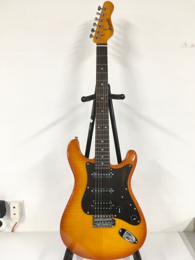 A Magneto U One series electric guitar. Comes with soft carry case.