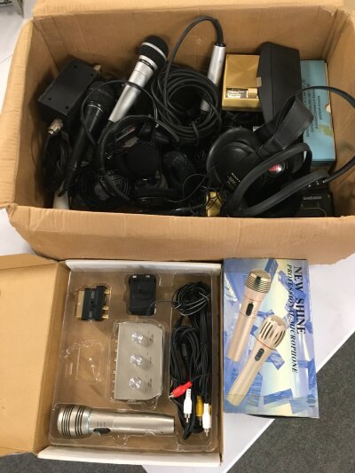 A box of microphones, headphones and accessories etc.