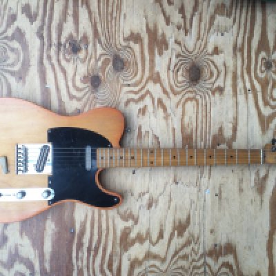 A Tokai breezysound Tele style electric guitar. Has been modified and fitted with Joe Barden pickups (not wired in) and Grover tuners. The original factory pickups are also included in this lot. No case.