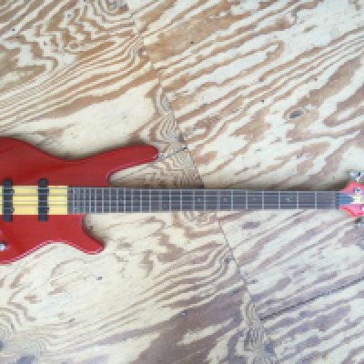 A Shine 5 string bass guitar. Comes with a soft carry case.
