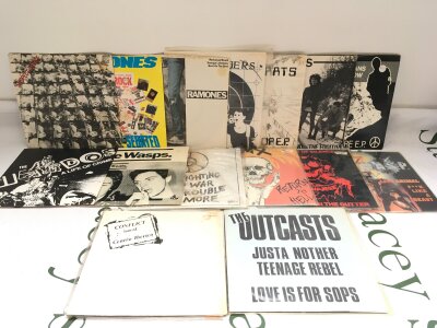 Fifteen punk 7" singles by various artists including The Outcasts, Stiff Little Fingers, The Prats and others.