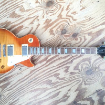 A limited edition Epiphone by Gibson Les Paul electric guitar. Comes with soft carry case. Some damage to the binding and around jack plate.