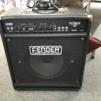 A Fender Rumble 75 bass amp and cover.