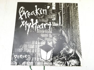A 1985 split 7" self released flexi disc from the Japanese hardcore punk bands The Prisoner and Dororo in 1985.