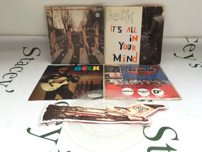 Two early Beck 7" singles, a Red Hot Chili Peppers Abbey Road EP and two Beastie Boys 7" singles including a No Sleep Till Brooklyn shaped disc (4).
